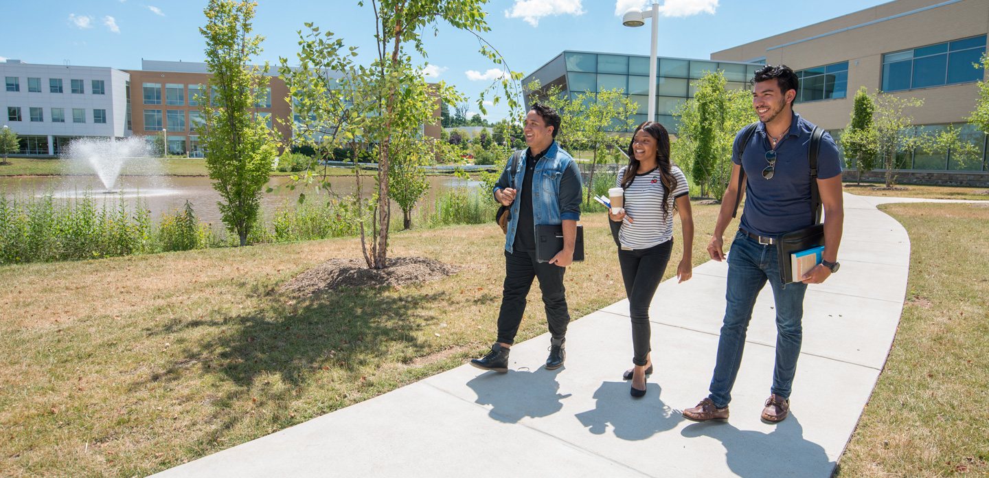 Three students touring the Loudoun campus.
