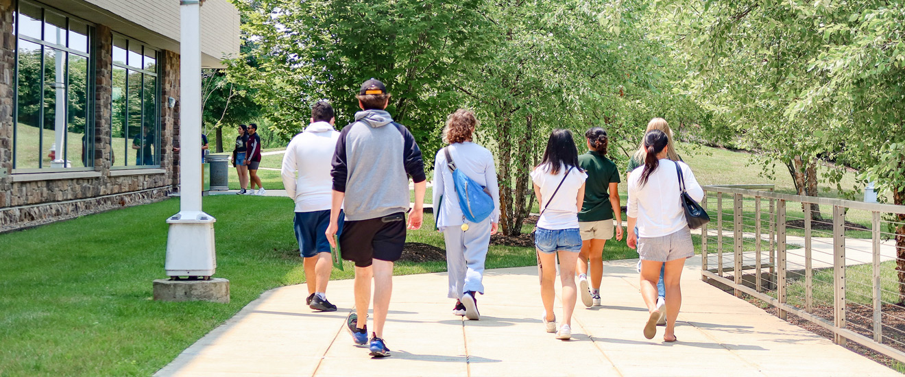 students walking on campus