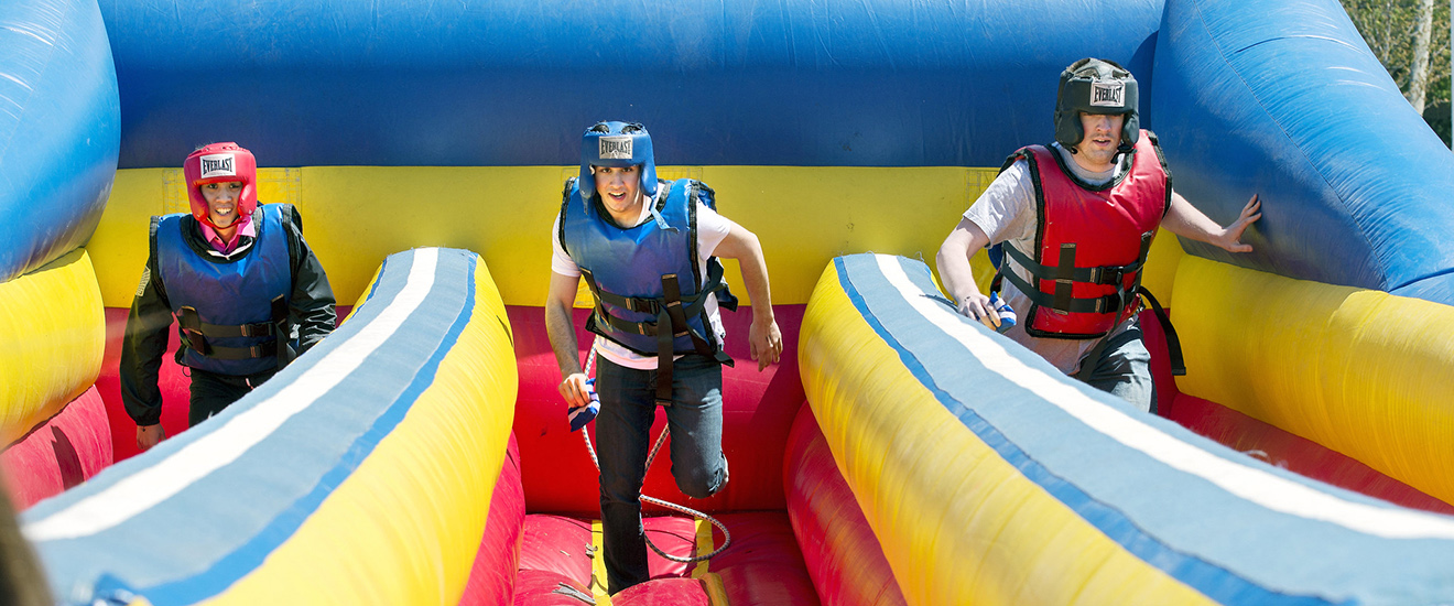 students playing on some equipment