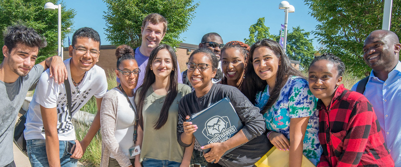 a happy group of students posing for a picture