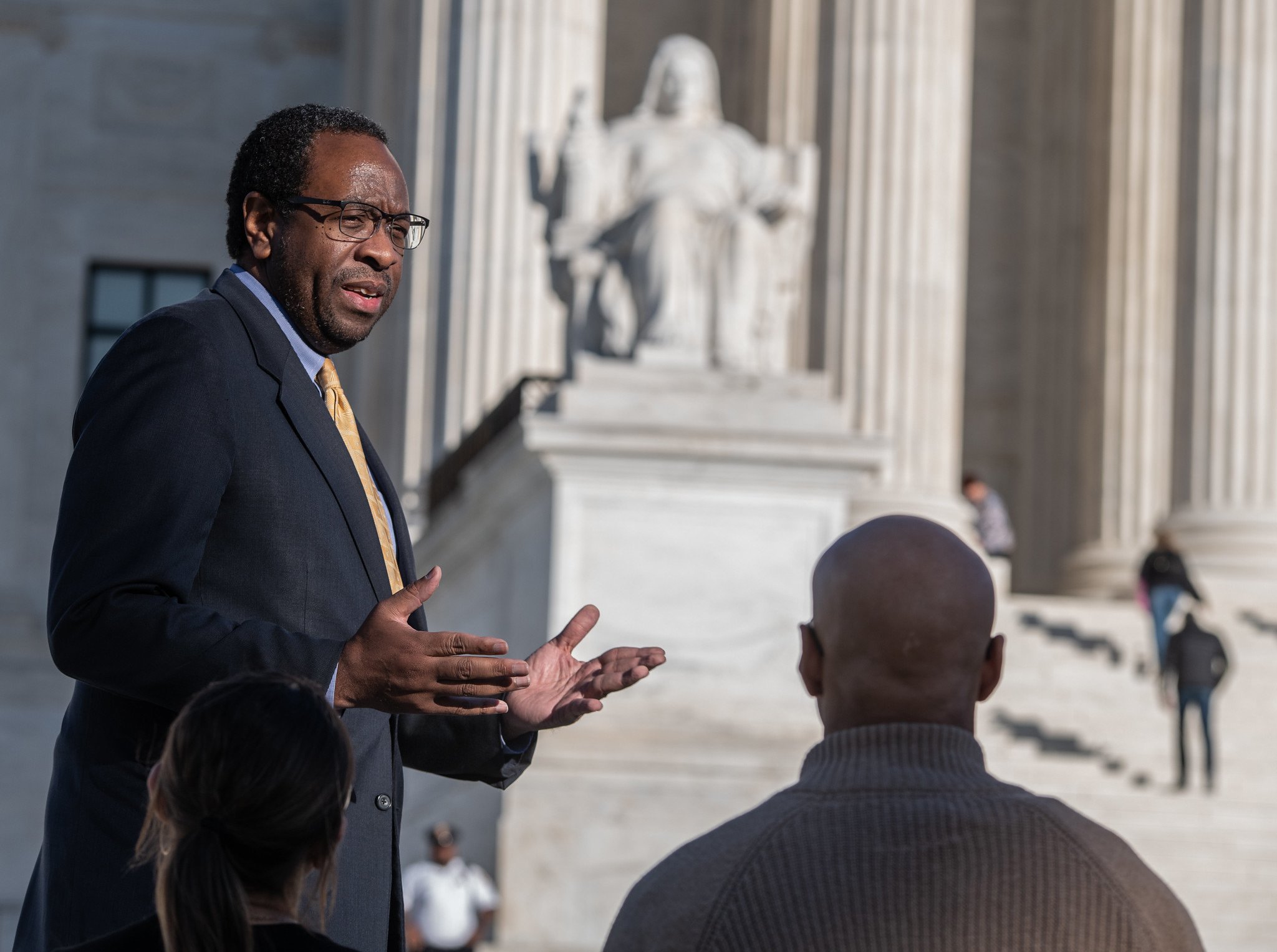 Professor Aldous McCrory Speaking in front of the Supreme Court building 
