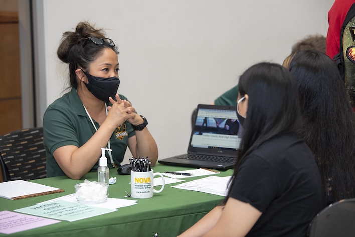 image of a counselor with a student