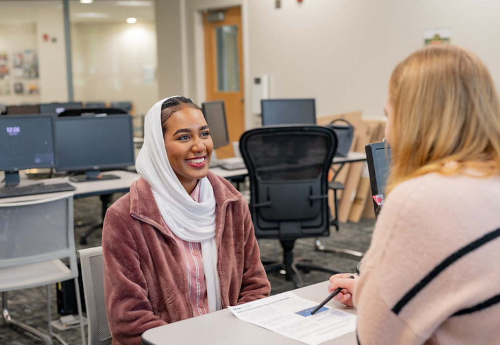 student with advisor