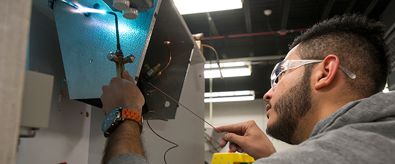 Student working with equipment