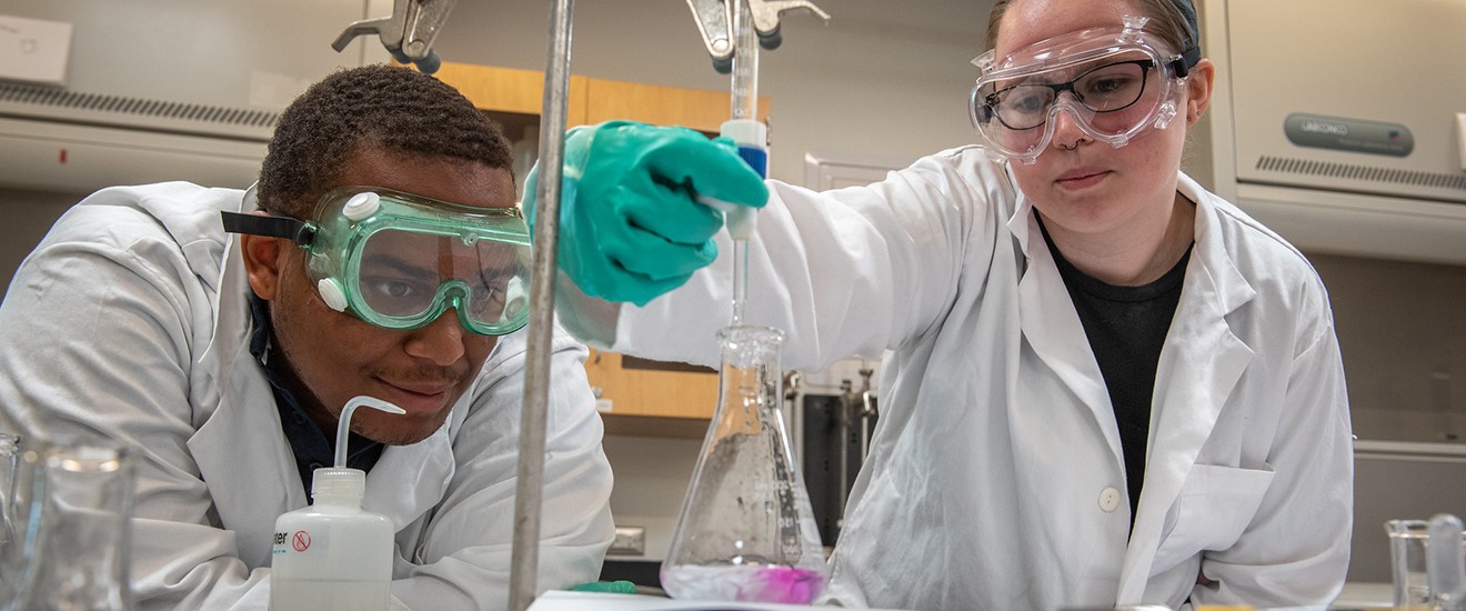 students working with lab equipment