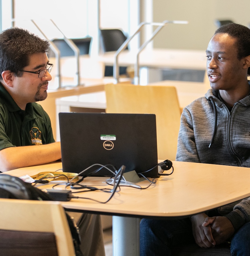 an advisor with a student