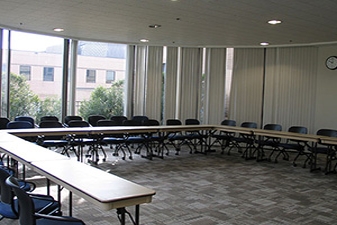 president's dining room with tables and chairs arranged in horseshoe