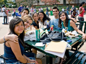 students around a table having lunch