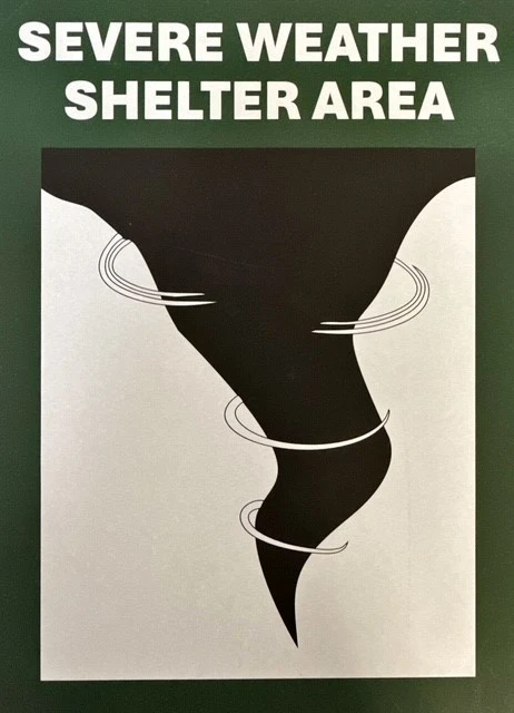 Severe Weather Shelter Area sign with a tornado graphic
