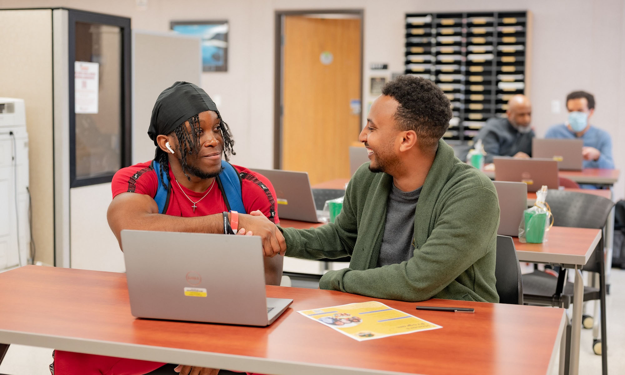 student meeting with an advisor during advising week