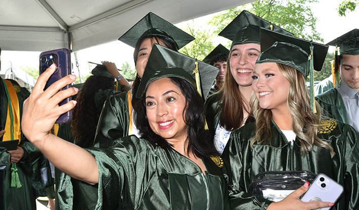 Graduates taking selfie