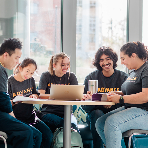 ADVANCE Students Sitting at a table